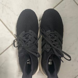 Black and white adidas ultra boost